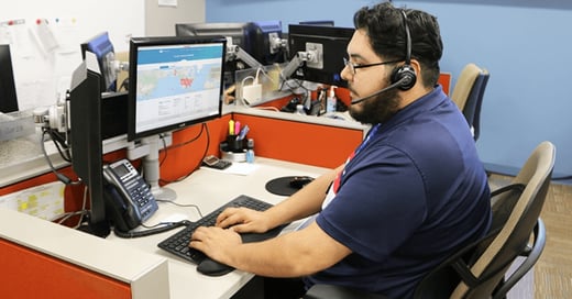 customer-support-looking-at-map-in-pc@2x