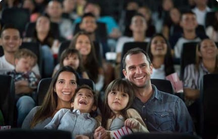 family-in-a-movie-theaters@2x