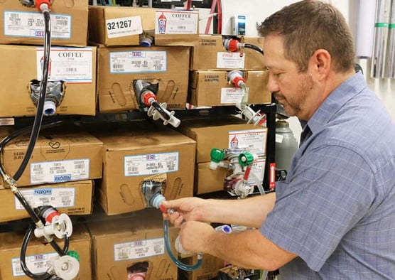 frozen carbonated beverage man cleaning