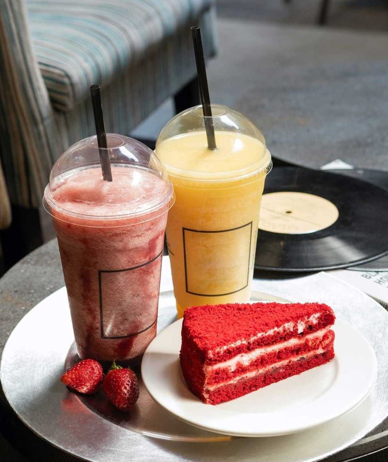 yellow-and-red-frozen-beverage-with-red-velvet-cake@2x