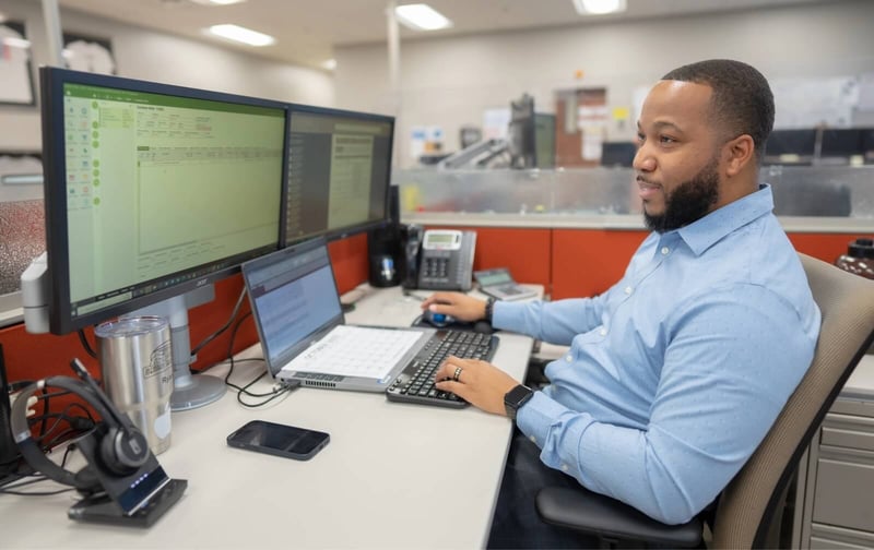 guy-looking-at-spreadsheet@2x