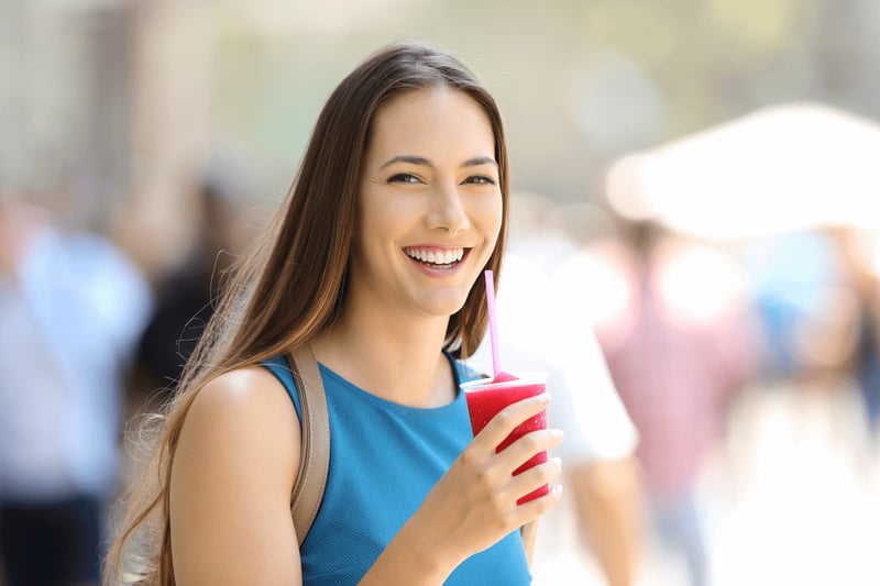 woman-with-frozen-drink--1600