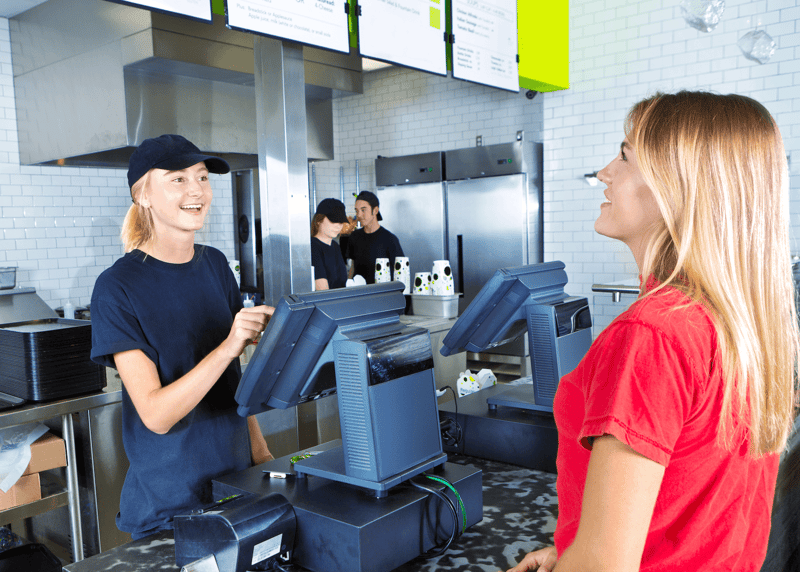FBD Frozen. Woman orders food at fast food restaurant.