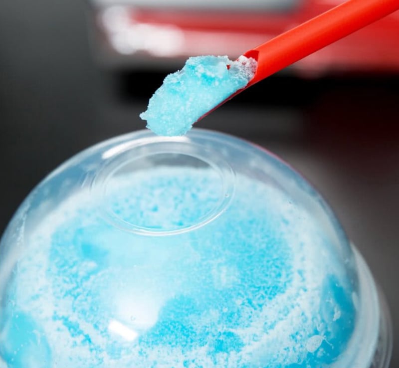 FBD Frozen. Blue frozen beverage and straw.